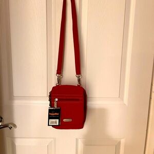 NWT Baggallini crossbody canvas purse.  Orange.